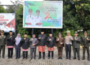 HUT ke-28 Kota Bekasi: Tri Adhianto dan Haris Bobihoe Sumbangkan Gaji Pertama Untuk Warga Terdampak Banjir