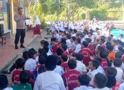 Polsanak, Anggota Polsek Idi Rayeuk Imbau Murid SD Menggunakan Sepeda Listrik di Jalan Raya