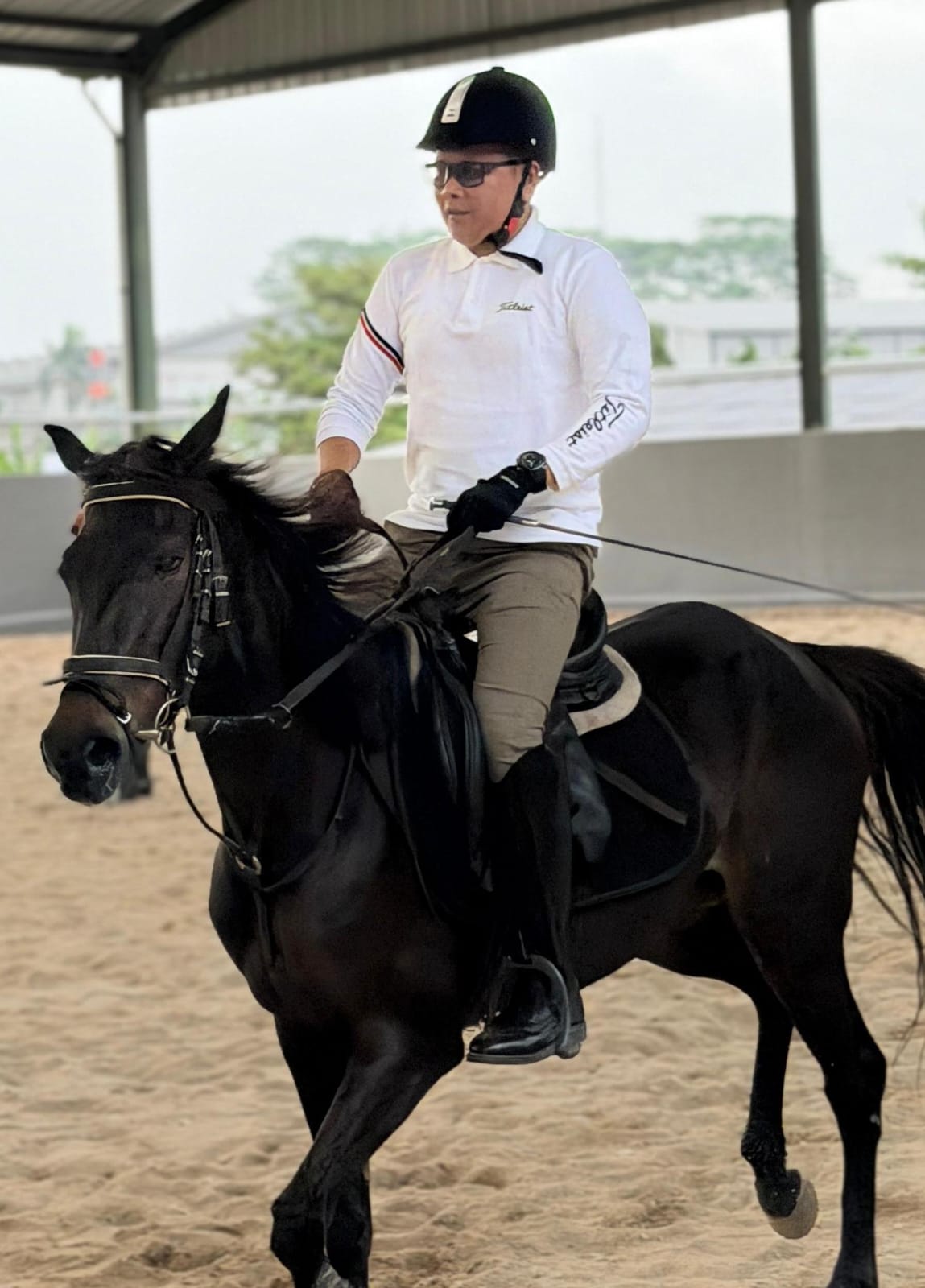 Dina Mustapid / Apit, salah satu penghobi berkuda (Foto: Yudi Bahtiar/Starindonews.com)